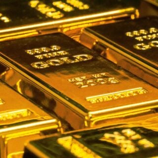 Gold kaufen: Der ultimative Guide für ein sicheres Investment eine Reihe mit Gold Barren
